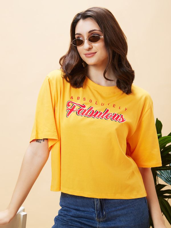 Globus Women Yellow Typography Print Round Neck Boxy Fit Casual Crop T-Shirt