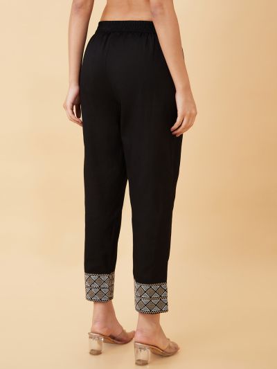 Globus Women Black Solid Regular Fit Slip-On Trouser with Embroidered Hem