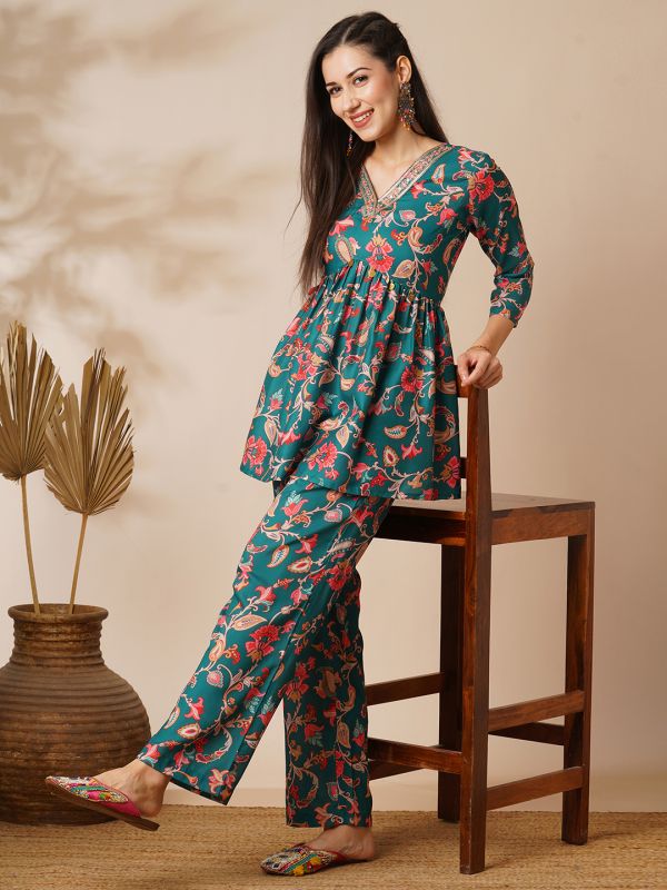 Globus Women Green Floral Embroidered Jaal Print V-Neck With Tassel Detailing A-Line Peplum Tunic & Mid Rise Partially Elasticated Ankle Length Pants Fusion Co-Ord Set