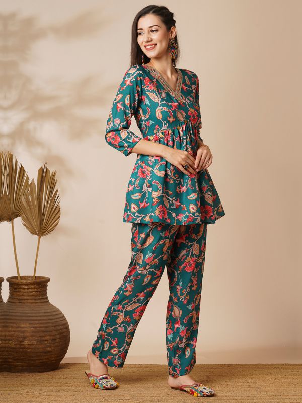 Globus Women Green Floral Embroidered Jaal Print V-Neck With Tassel Detailing A-Line Peplum Tunic & Mid Rise Partially Elasticated Ankle Length Pants Fusion Co-Ord Set