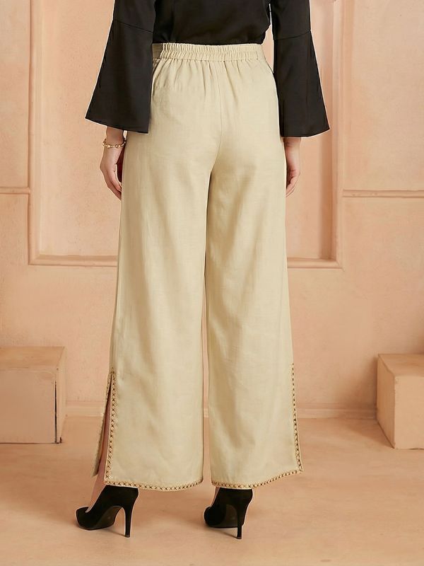 Globus Women Beige Mid Rise Flared Embroidered Hem Side Slits Fusion Palazzos