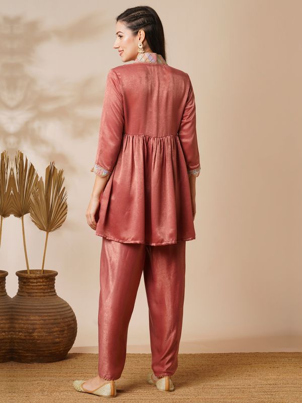 Globus Women Pink Overlapping Sequined Lace V-Neck Scalloped Sleeves Velvet Peplum Tunic & Mid-Rise Ankle Length Partial Elasticated Dhoti Fusion Co-Ord Set